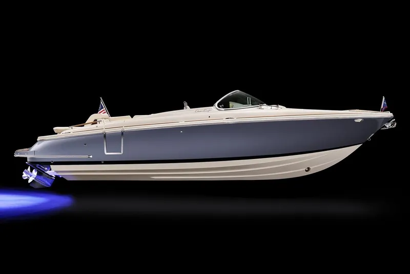 Slide: The Image of Manufacturer Provided Image: 2025 Chris-Craft Launch 28 GT boat with sleek design and blue hull. - 18