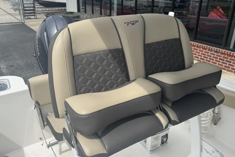 Slide: The Image of Tidewater 210 CC Adventure 2020 boat seats with stylish upholstery and armrests. - 10