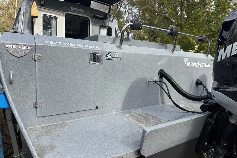 Slide: The Image of 2017 KingFisher 2825 Offshore boat with Pre-Flex technology, featuring a Mercury engine. - 17