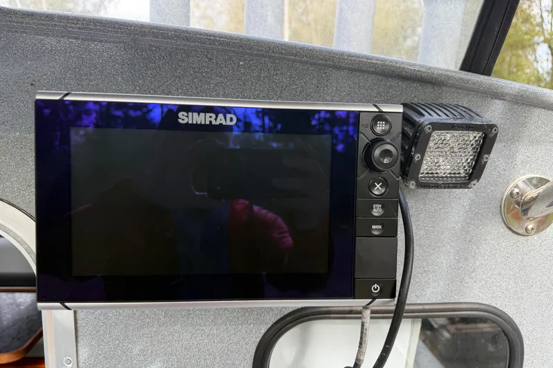 Slide: The Image of Simrad display on 2017 KingFisher 2825 Offshore boat dashboard. - 26