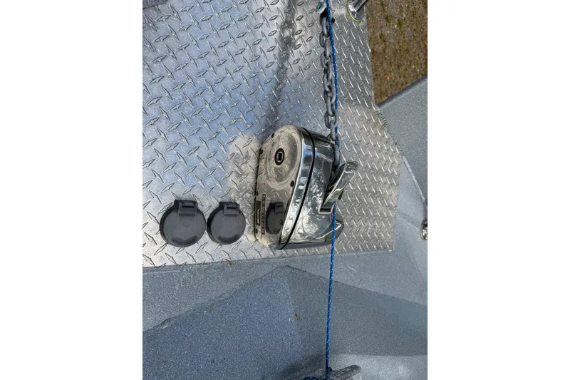 Slide: The Image of 2017 KingFisher 2825 Offshore boat deck with anchor winch and chain. - 30