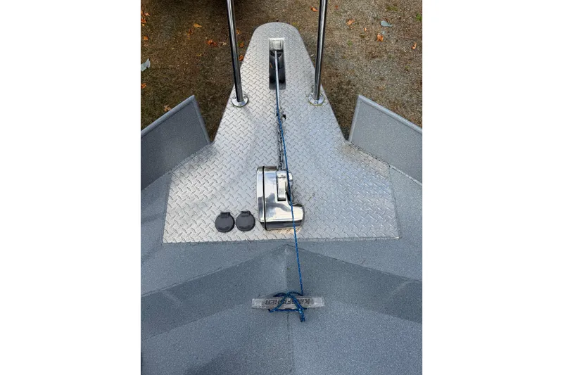 Slide: The Image of Bow of 2017 KingFisher 2825 Offshore boat with anchor and metal deck. - 31