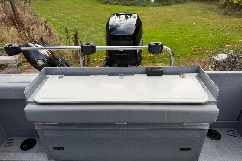 Slide: The Image of 2017 KingFisher 2825 Offshore boat with outboard motor and fishing rod holders. - 38