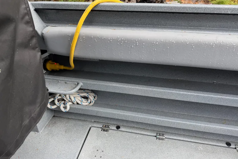 Slide: The Image of Starboard cockpit storage and shore power - 50