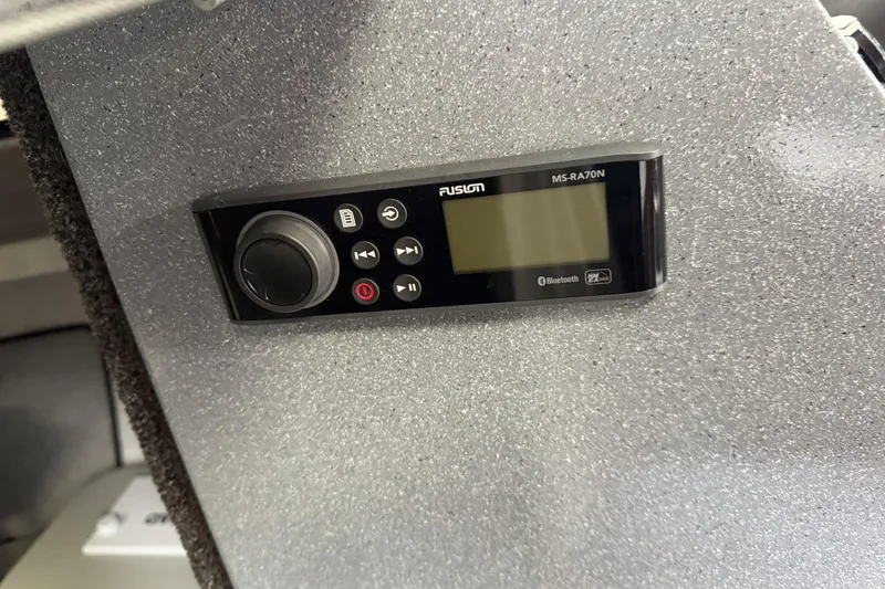 Slide: The Image of Fusion MS-RA70N stereo system on 2017 KingFisher 2825 Offshore boat dashboard. - 62