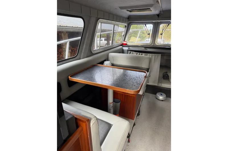 Slide: The Image of Interior of 2017 KingFisher 2825 Offshore boat with seating and table. - 78