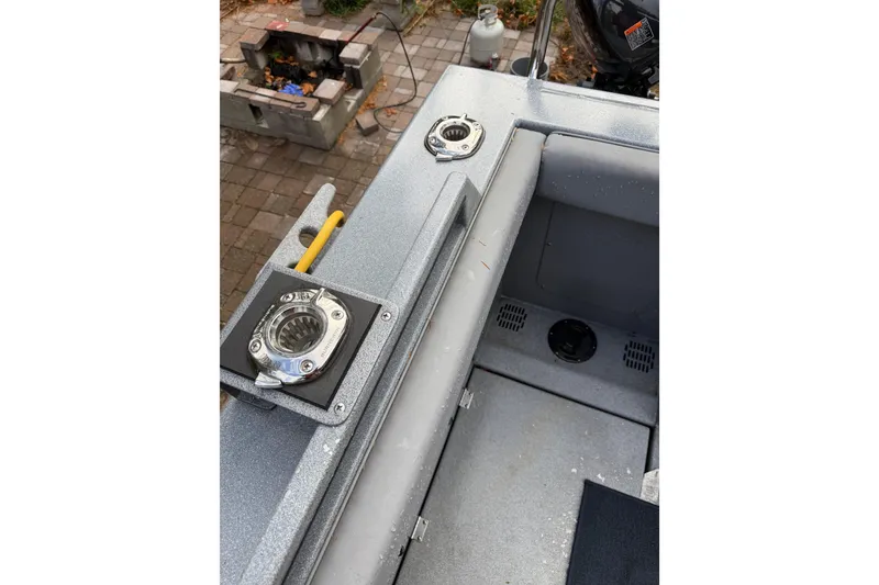 Slide: The Image of 2017 KingFisher 2825 Offshore boat deck with rod holders and storage compartments. - 80