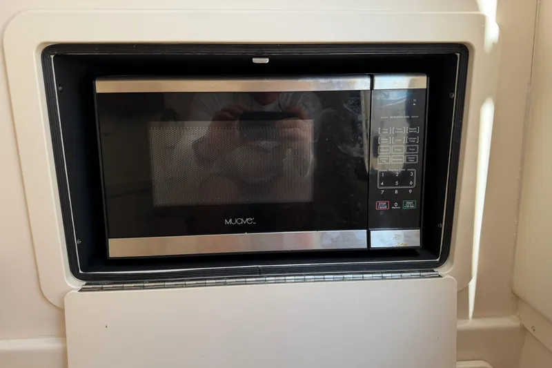 Slide: The Image of Built-in microwave on 2017 Grady-White Freedom 335 boat. - 44