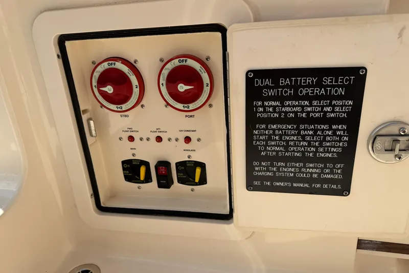Slide: The Image of Control panel of a 2017 Grady-White Freedom 335 boat with dual battery switches. - 51