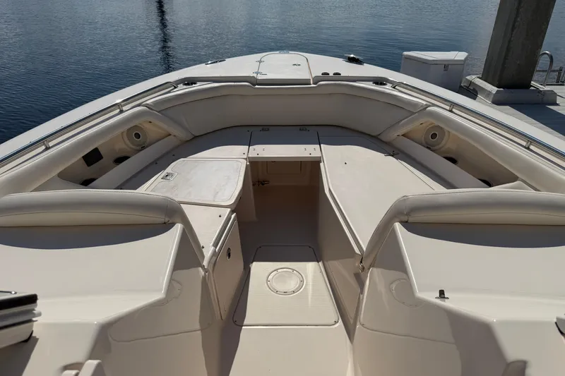 Slide: The Image of 2017 Grady-White Freedom 335 boat interior with spacious seating and storage. - 9