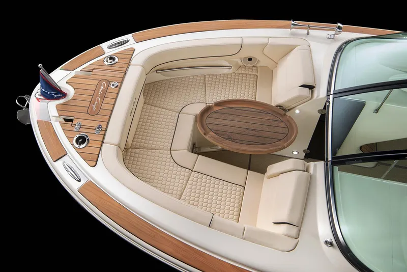 Slide: The Image of Manufacturer Provided Image: Luxurious 2025 Chris-Craft Launch 25 GT boat interior with elegant seating and wooden accents. - 3