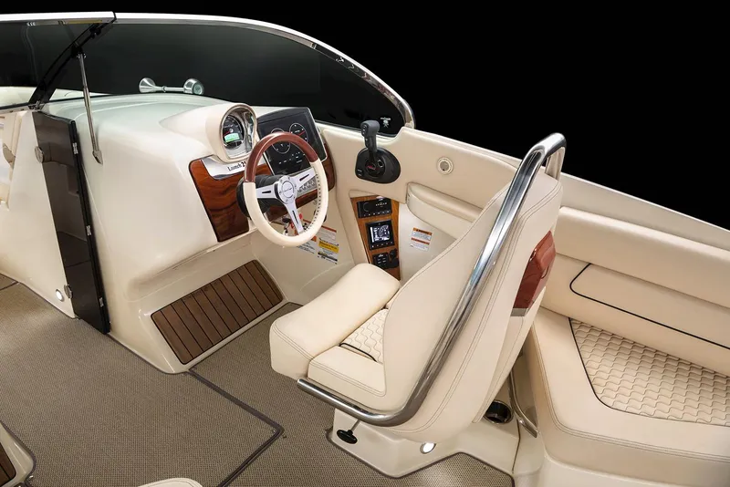 Slide: The Image of Manufacturer Provided Image: 2025 Chris-Craft Launch 25 GT interior with elegant beige seating and modern dashboard. - 5