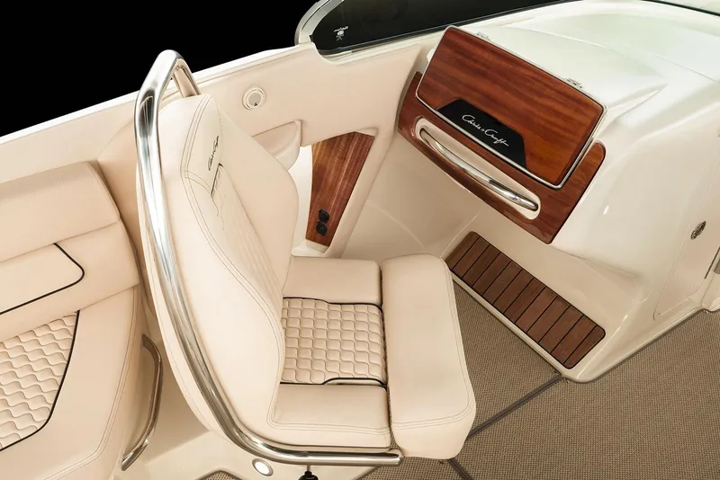 Slide: The Image of Manufacturer Provided Image: Luxurious interior of 2025 Chris-Craft Launch 25 GT boat with elegant seating and wood accents. - 8