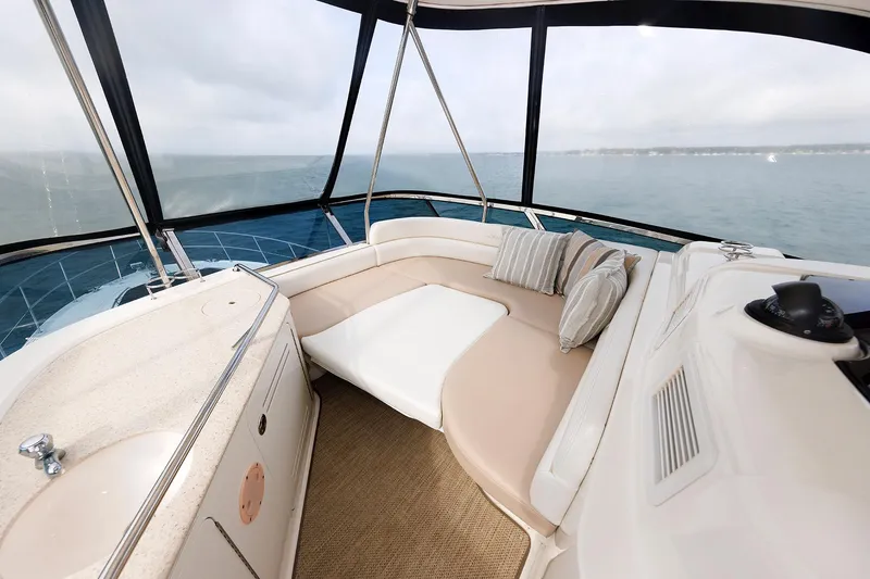 Slide: The Image of Luxurious interior of 2010 Sea Ray 520 Sedan Bridge yacht with ocean view. - 18