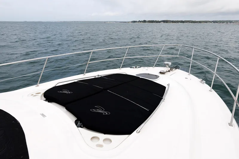 Slide: The Image of 2010 Sea Ray 520 Sedan Bridge yacht deck with ocean view. - 36