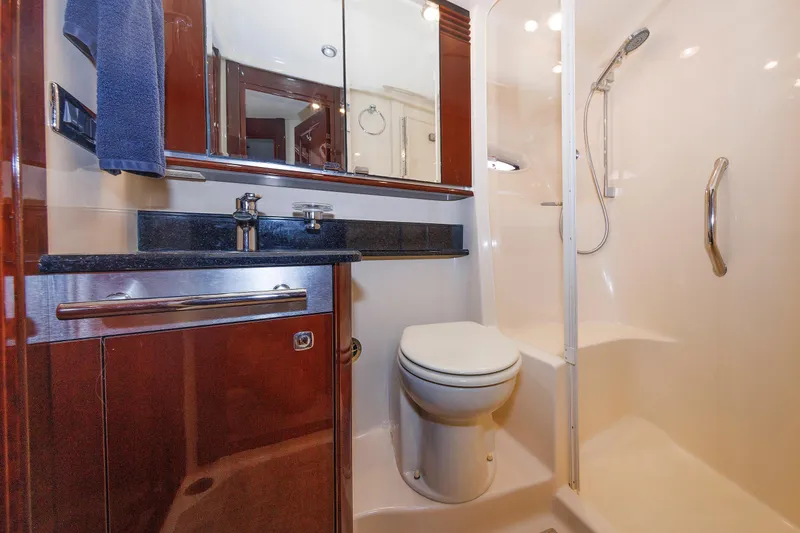 Slide: The Image of Luxurious bathroom in 2010 Sea Ray 520 Sedan Bridge yacht with modern fixtures. - 56