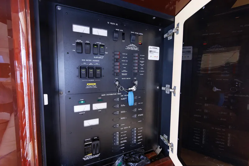 Slide: The Image of Electrical control panel inside 2010 Sea Ray 520 Sedan Bridge yacht. - 60