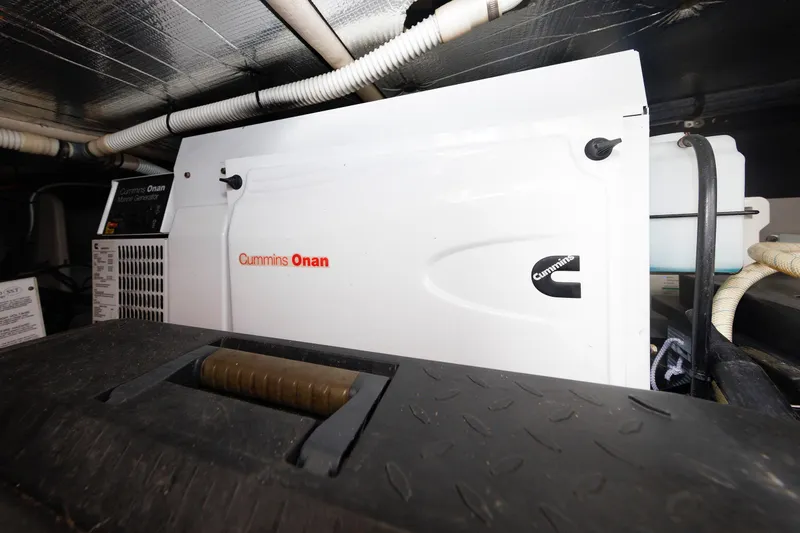Slide: The Image of Cummins Onan marine generator in 2010 Sea Ray 520 Sedan Bridge engine room. - 61