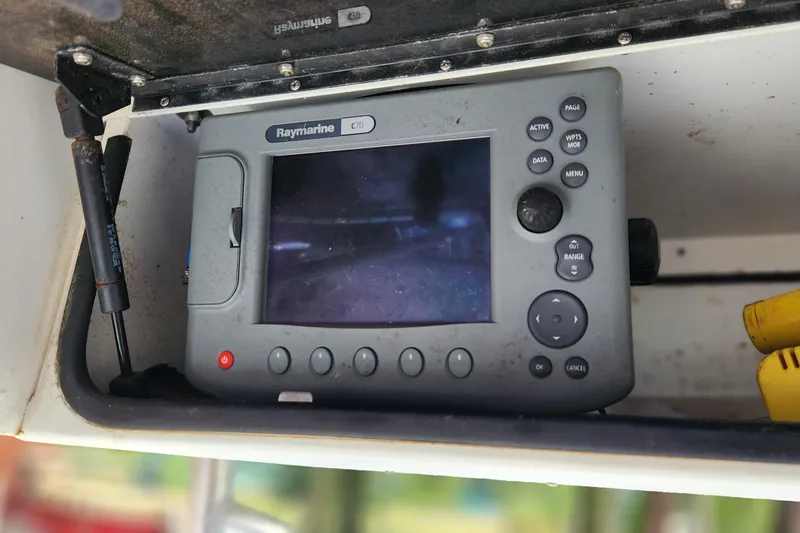 Slide: The Image of Raymarine C70 navigation system on 2005 Polar 2310 Bay boat dashboard. - 13