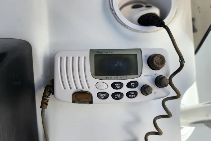 Slide: The Image of Raymarine VHF radio on 2005 Polar 2310 Bay boat dashboard. - 14