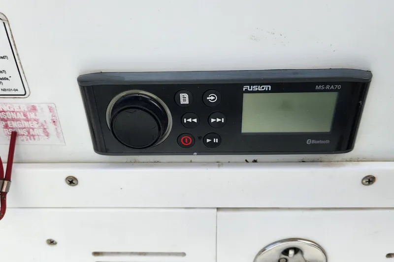 Slide: The Image of Fusion MS-RA70 Bluetooth stereo system on 2005 Polar 2310 Bay boat dashboard. - 15
