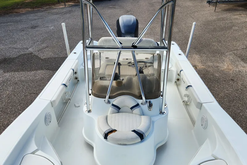 Slide: The Image of 2005 Polar 2310 Bay boat interior with seating and steering console. - 9
