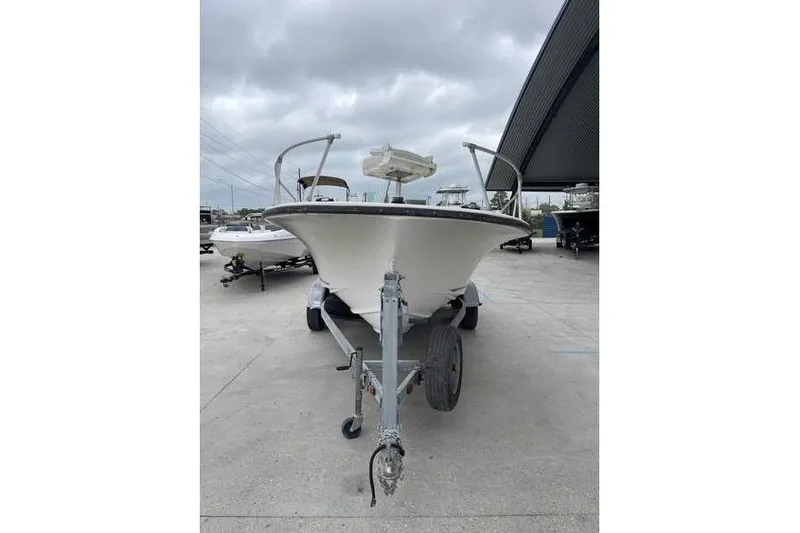 Slide: The Image of 1973 Wellcraft 200 Fisherman boat with Mercury 200 EFI engine on trailer. - 4