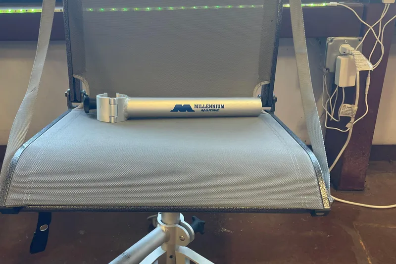 Slide: The Image of Millennium Marine seat on a Ranger Z185 boat, 2018 model, with visible wiring. - 9