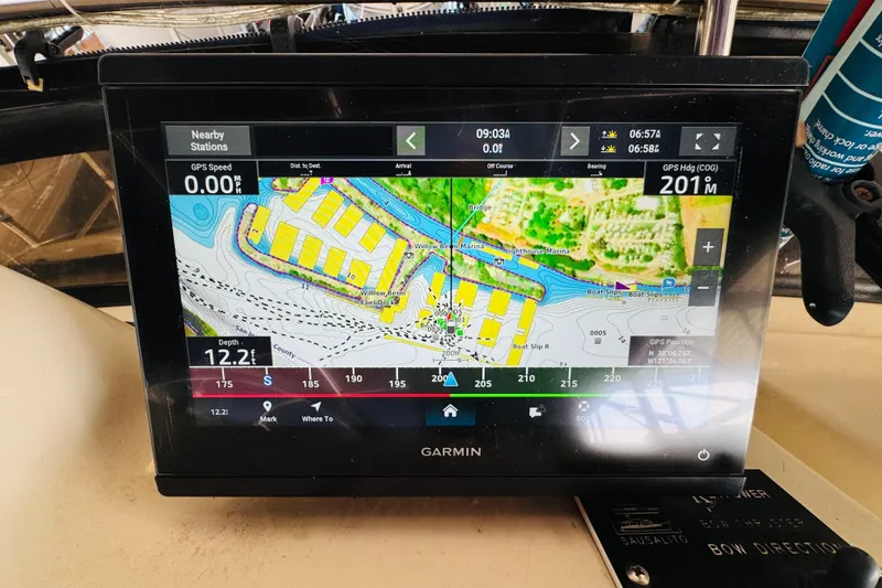 Slide: The Image of Garmin GPS display on 1986 Californian 48 Motor Yacht, showing marina map and navigation details. - 29