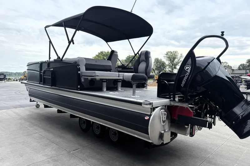 Slide: The Image of 2026 Premier 230 SOLARIS RS pontoon boat with canopy and Mercury outboard motor. - 10