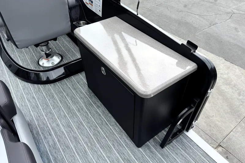 Slide: The Image of Premier 230 SOLARIS RS 2026 boat interior with seating and storage unit. - 15