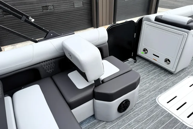 Slide: The Image of 2026 Premier 230 Solaris RS boat interior with modern seating and sleek design. - 17