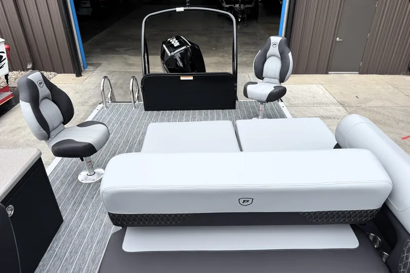 Slide: The Image of 2026 Premier 230 SOLARIS RS boat interior with modern seating and sleek design. - 32