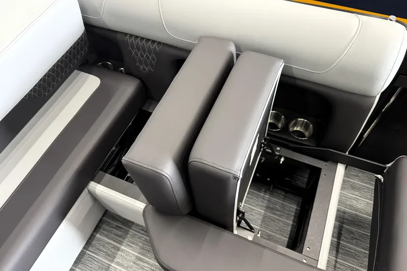 Slide: The Image of Interior seating of 2026 Premier 230 Solaris RS boat with cup holders and storage. - 37