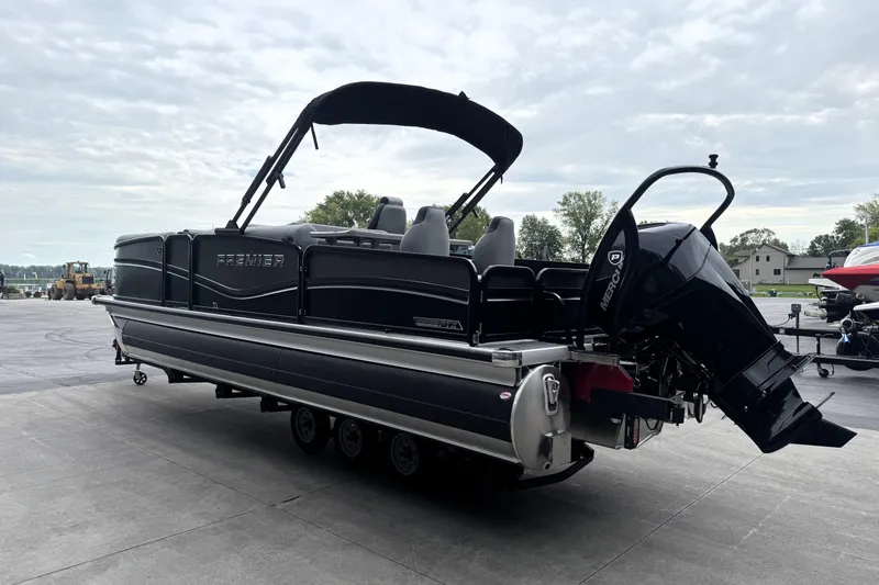 Slide: The Image of 2026 Premier 230 SOLARIS RS pontoon boat with outboard motor on a trailer. - 4