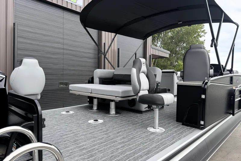 Slide: The Image of 2026 Premier 230 SOLARIS RS pontoon boat with modern seating and canopy. - 44