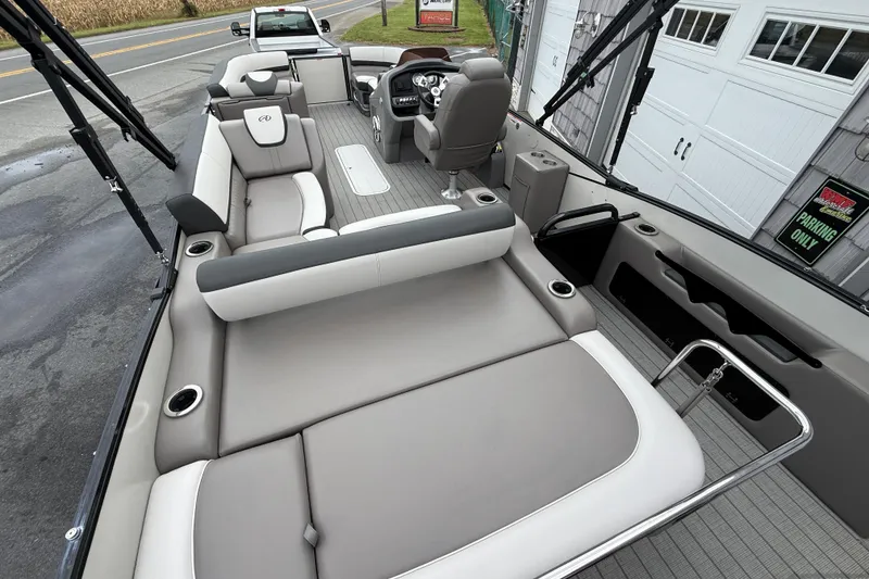 Slide: The Image of 2022 Avalon 2585 Catalina VRB Tri Toon boat interior with luxurious seating and modern design. - 12