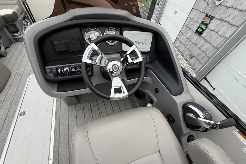 Slide: The Image of Steering console of 2022 Avalon 2585 Catalina VRB with Garmin display and modern controls. - 22
