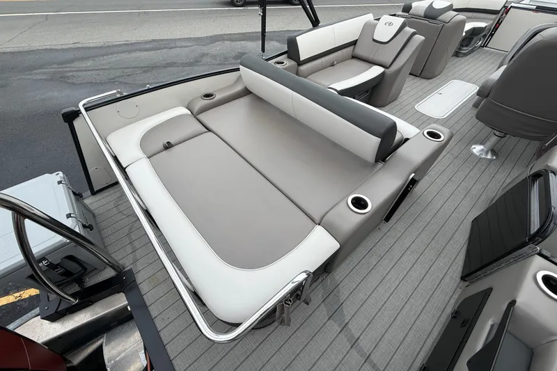 Slide: The Image of 2022 Avalon 2585 Catalina VRB boat interior with luxurious seating and cup holders. - 27