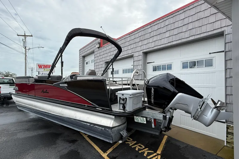 Slide: The Image of 2022 Avalon 2585 Catalina VRB Tri Toon with Mercury 250 V-8 Verado engine parked outside. - 6