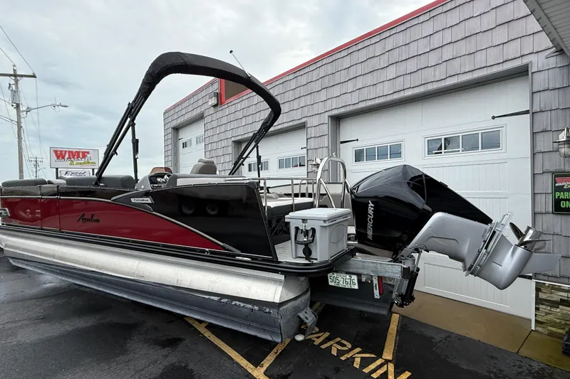 Slide: The Image of 2022 Avalon 2585 Catalina VRB Tri Toon with Mercury 250 V-8 Verado engine, parked outside. - 7