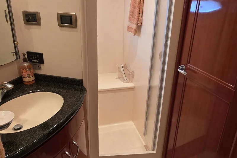 Slide: The Image of Bathroom interior of 2006 Carver 56 Voyager yacht with sink and shower. - 35
