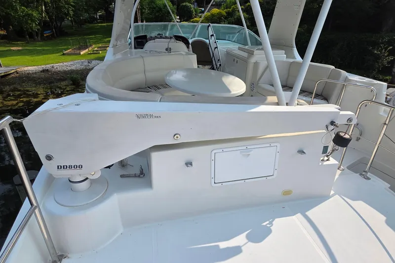 Slide: The Image of 2006 Carver 56 Voyager yacht deck with seating and equipment. - 70