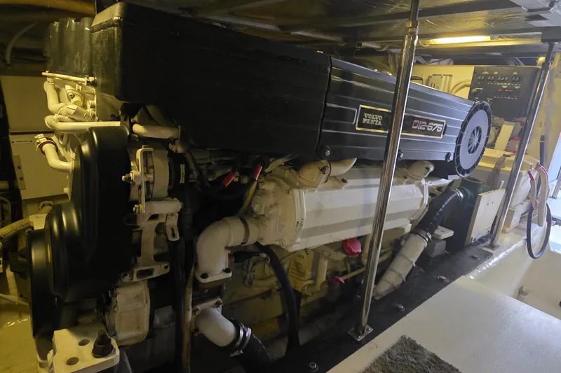 Slide: The Image of Engine room of a 2006 Carver 56 Voyager with Volvo Penta D12-675 engine. - 76