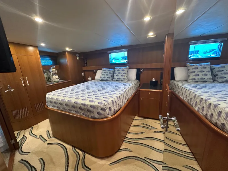 Slide: The Image of Luxurious cabin interior of 2005 Jefferson Rivanna 50 SDMY yacht with elegant wood finish. - 28