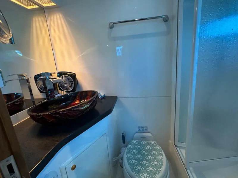Slide: The Image of Luxurious bathroom on 2005 Jefferson Rivanna 50 SDMY yacht with vessel sink and shower. - 29