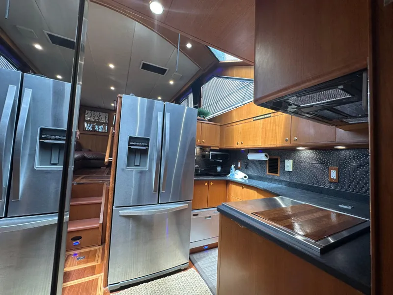 Slide: The Image of Luxurious kitchen interior of 2005 Jefferson Rivanna 50 SDMY yacht with modern appliances. - 38
