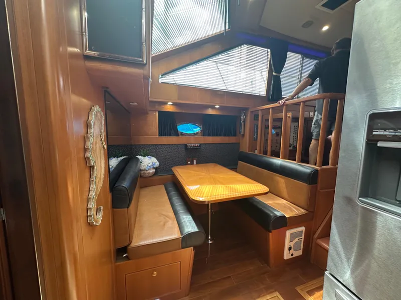 Slide: The Image of Interior of 2005 Jefferson Rivanna 50 SDMY yacht with dining area and wooden finishes. - 41