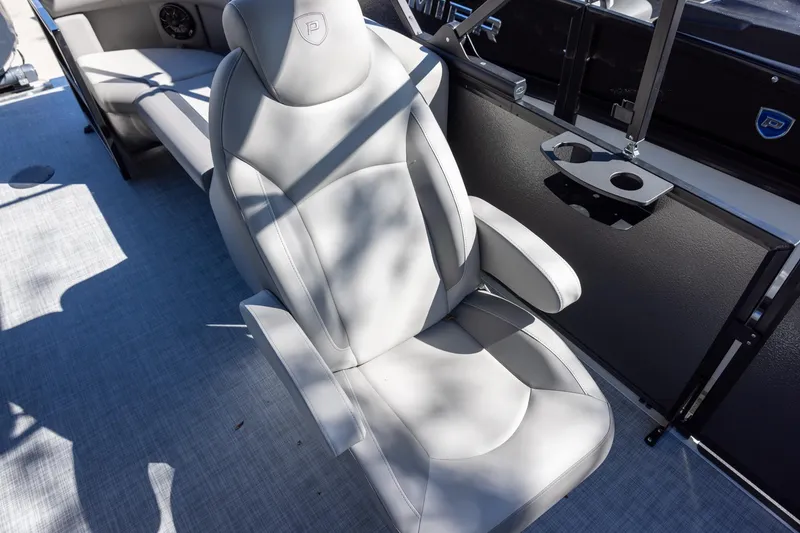 Slide: The Image of Luxurious seating on 2026 Premier 220 Sunscape RF boat with cup holders. - 10