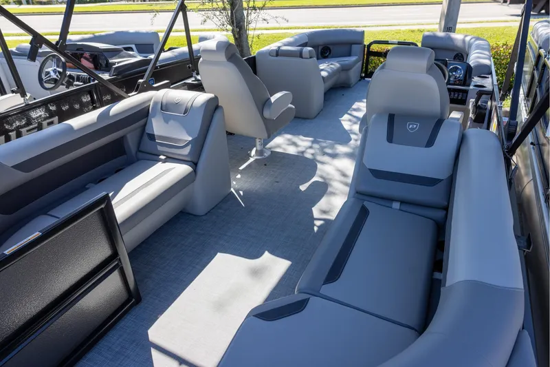 Slide: The Image of 2026 Premier 220 Sunscape RF pontoon boat interior with spacious seating and modern design. - 5